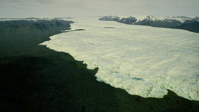 Overview showing Greenland ice shelf retreat and melt channels into open water, fractured sea ice and dark melt pools, environmental urgency and study focus.