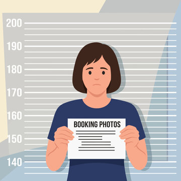 A person stands in front of a booking photo backdrop, displaying a somber expression, capturing themes of justice, consequences, and societal issues.