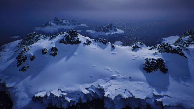 aerial frozen cape under moonlight, expansive snowfields and jagged rock outcrops, calm dark ocean beyond, cold blue tones and subtle starlight.