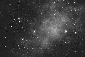 Fototapeta premium A captivating night sky filled with twinkling stars and cosmic wonders. The image captures the mystery and vastness of the universe