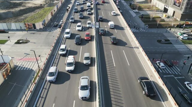 Aerial view of heavy rush hour traffic flow on wide urban bridge infrastructure in Belgrade, Serbia.