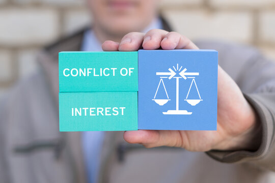 Concept of conflict of interest and law in business.