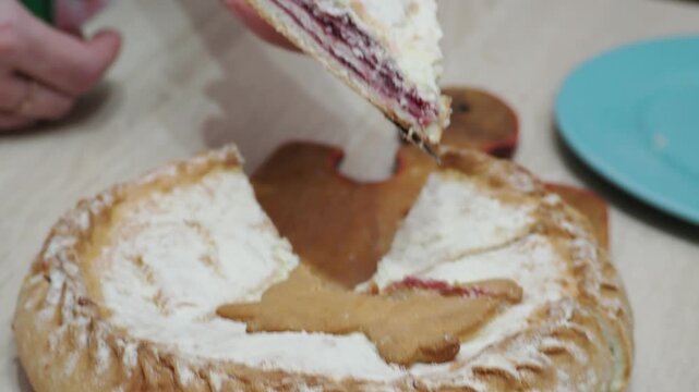 A girl at home cuts a freshly baked pie with berries, Apple pie baking as a sweet dessert with a golden lattice crust