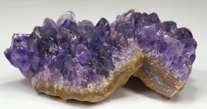 Amethyst gemstones, violet quartz variety often used in rings, necklaces, and jewelry. Violet amethyst crystal, popular semi precious stone for decorative jewelry