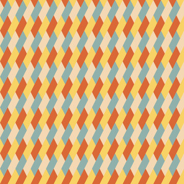 Seamless pattern designed from diagonal orange, blue, yellow and cream parallelograms