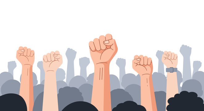 Raised fists symbolizing unity and strength in a crowd