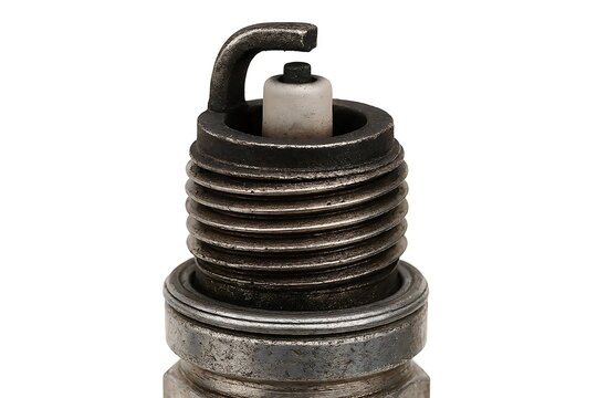 Close-up of used spark plug isolated on white background