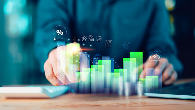 Financial analyst reviews interest rate and dividend data on a digital dashboard, highlighting yield trends, investment returns, portfolio strategy, banking insights, and market performance.