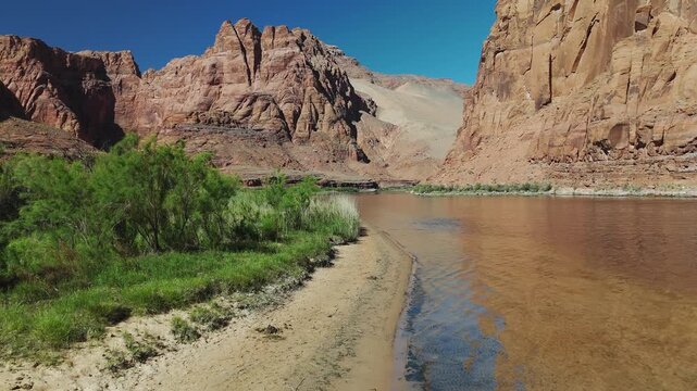 Drone View Of Shoreline Of Colorado River In Arizona With Red Rock Reflections