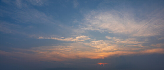 Fototapeta premium soft cloud on orange and blue sunset sky background