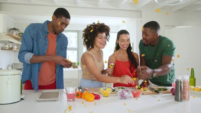 Four friends picking veggies, threading skewers in kitchen, star overlay showing party food prep