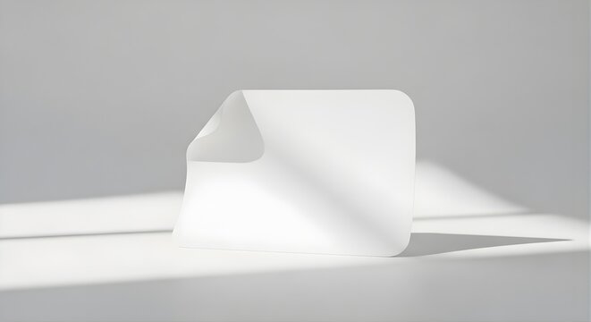 Isolated piece of blank paper with a folded corner, curved edge, soft lighting, template for notes, messages, reminders