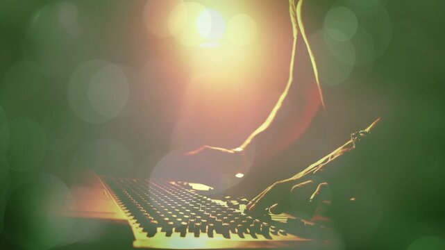 Male operator reaching console, sliding faders and balancing mix for live music with lens flare