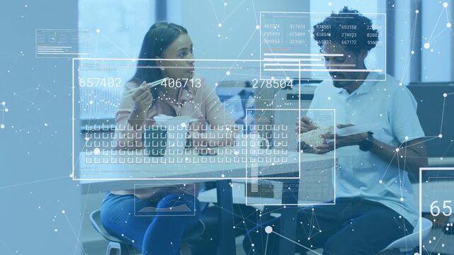 Woman raising chopsticks and speaking at business lunch, man eating, HUD tracking duo, relaxing