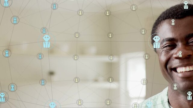 Man entering from right, laughing and settling while animated tech icons highlighting connections