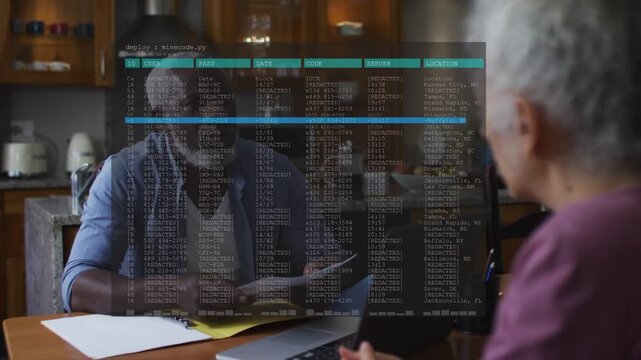 Vertical video: Couple at table reviewing bills, woman tapping laptop causing finance data overlay