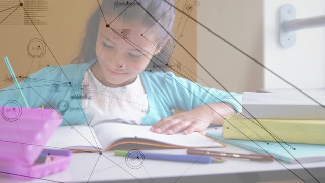 Student leaning at desk, turning page and reaching pencil, writing while HUD animating learning