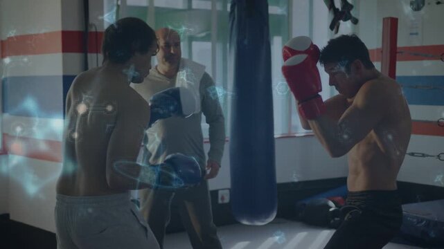 Vertical video: Coach cueing, two shirtless boxers jabbing for drills in boxing gym with overlays