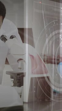 Lab worker peering at microscope, adjusting slide and focus, inspecting slide, right HUD overlaying