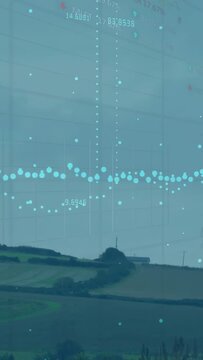Vertical video: Pole sending signal and forming farm line charts over field for crop insight