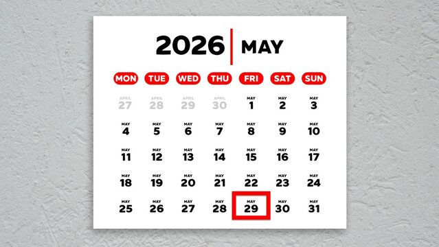 The date May 29th marked with a red cursor on a wall calendar 2026