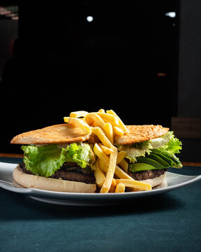 Juicy burger with crisp lettuce and golden fries