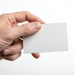 Obraz premium A person holding and pointing at a small, round object with gloved hands.