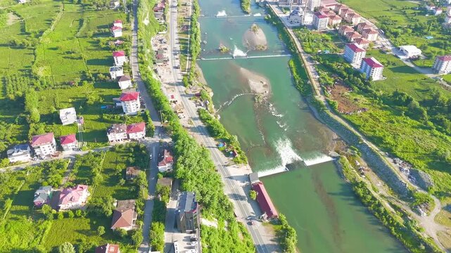 Ardeshen, Turkey. The place where the river flows into the Black Sea. Firtina River Valley. Sunny morning. Aerial View, MasterShots, Fly Forward - Roll, Tilt up