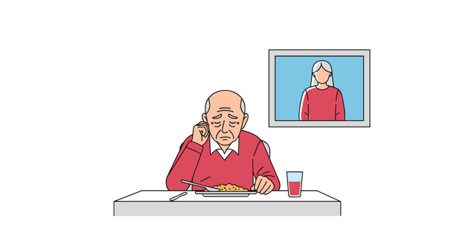 Lonely senior man sitting at table eating meal alone while looking sadly at portrait of his late wife hanging on the wall.