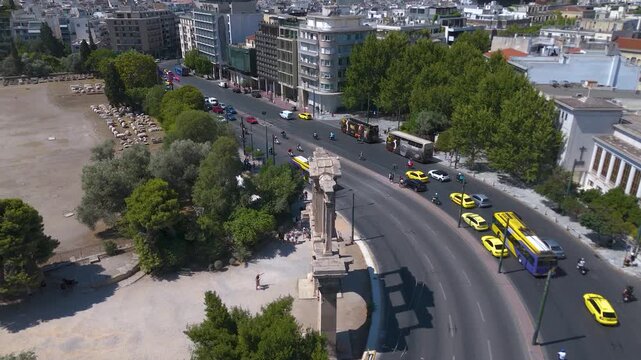 Athens, Greece: Aerial view of Hadrian&rsquo;s Arch and the ancient ruins of Athens on a sunny day.