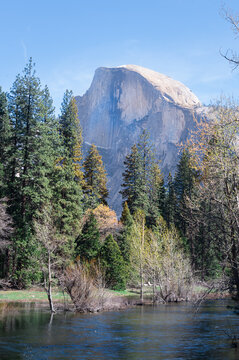 Half Dome in Yosemite National Park with the Merced River in the foreground