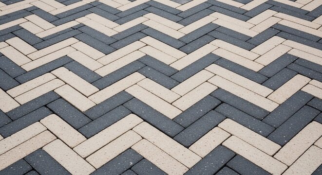 Geometric pattern of interlocking bricks in a zigzag arrangement, outdoor pavement texture, architectural detail, clean design.