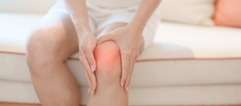 woman having knee ache and muscle pain due to Runners Knee or Patellofemoral Pain Syndrome, osteoarthritis, arthritis, rheumatism and Patellar Tendinitis. health and medical concept