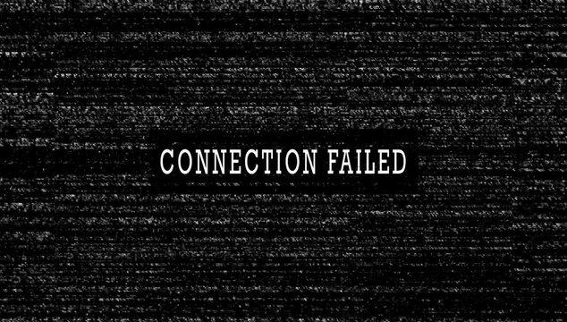 A computer screen displays a connection failed error message in a dark environment.