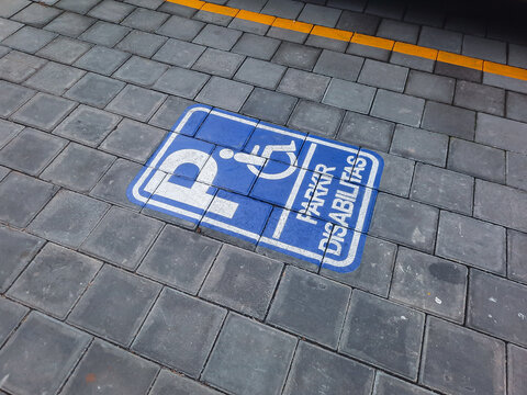 Blue lines and disabled sign place on parking