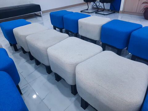 waiting room with blue and white chairs