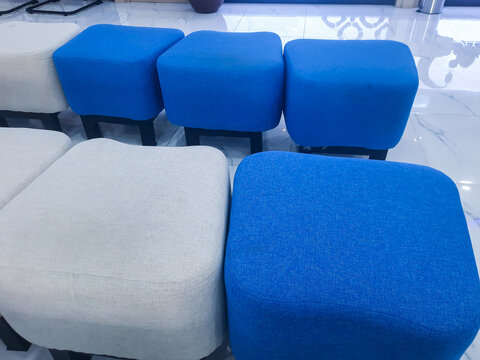 waiting room with blue and white chairs