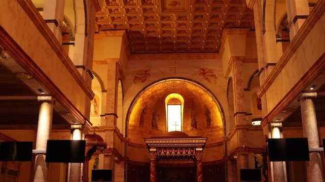 Interior view of Saint George Maronite Cathedral in downtown Beirut. Grand altar and golden religious art showcasing the Christian heritage and sacred architecture of the Lebanese capital