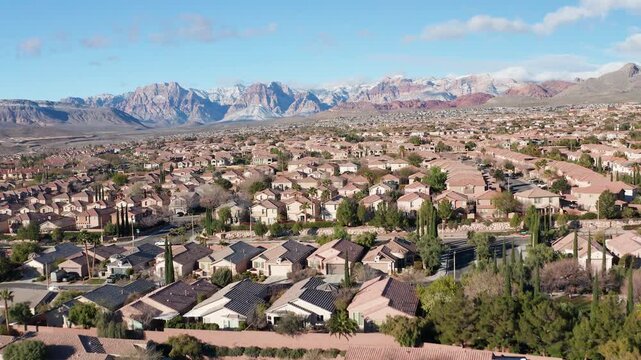 Aerial Rising Shot of Summerlin Suburbs Towards Red Rock Canyon