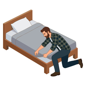 Man making bed in bedroom with brown furniture and gray sheets