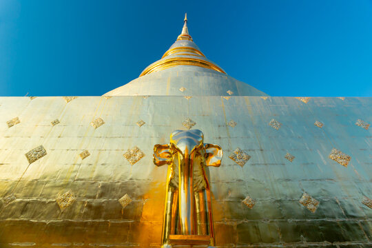 Golden stupa at Wat Phra Singh temple in Chiang Mai, Thailand	
