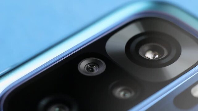 Macro close up of a smartphone camera lens on back
