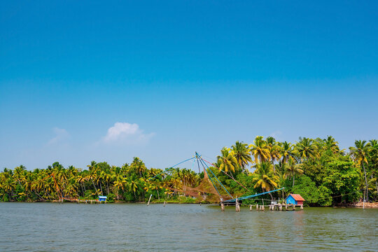 Kerala backwaters, India. Fishing boats on the canals