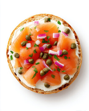 Smoked salmon bagel slice with cream cheese red onion capers and fresh parsley topping
