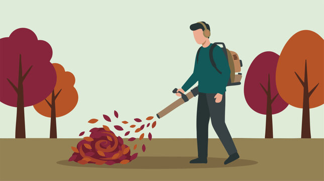 Man using a backpack leaf blower to clear autumn leaves in a yard