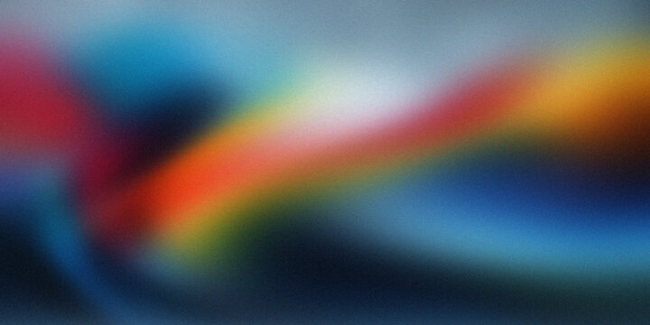 Vibrant rainbow gradient blur background with soft colors and abstract design