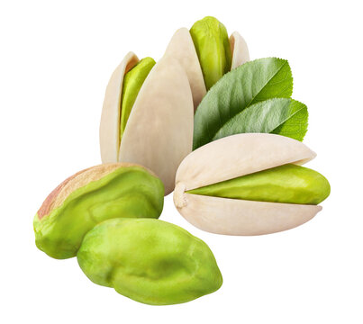 Pistachio nuts with green leaves, isolated on cutout transparent background