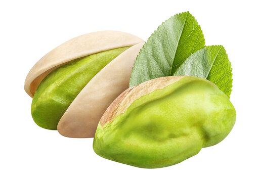 Pistachio nuts with green leaves, isolated on cutout transparent background