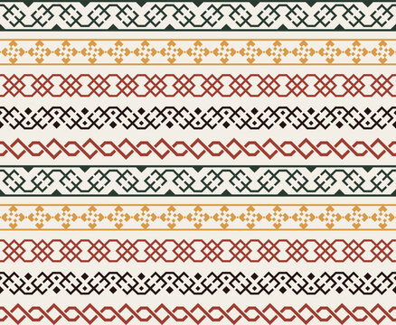 Traditional Slavic folk embroidery seamless pattern with geometric borders in red, green and ochre for ethnic textile and rustic holiday decor
