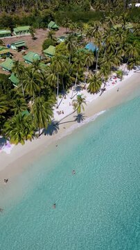 Explore the breathtaking landscapes of Koh Kood Thailand, where palm trees sway gently and the turquoise water invites relaxation.